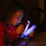kid holding a UV light