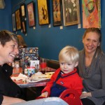 A patron and her son with Sherree Goldstein