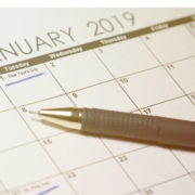 New Year's Day 2019 on calendar. Pen and calendar january 2019, with drawn text New Year's Day.