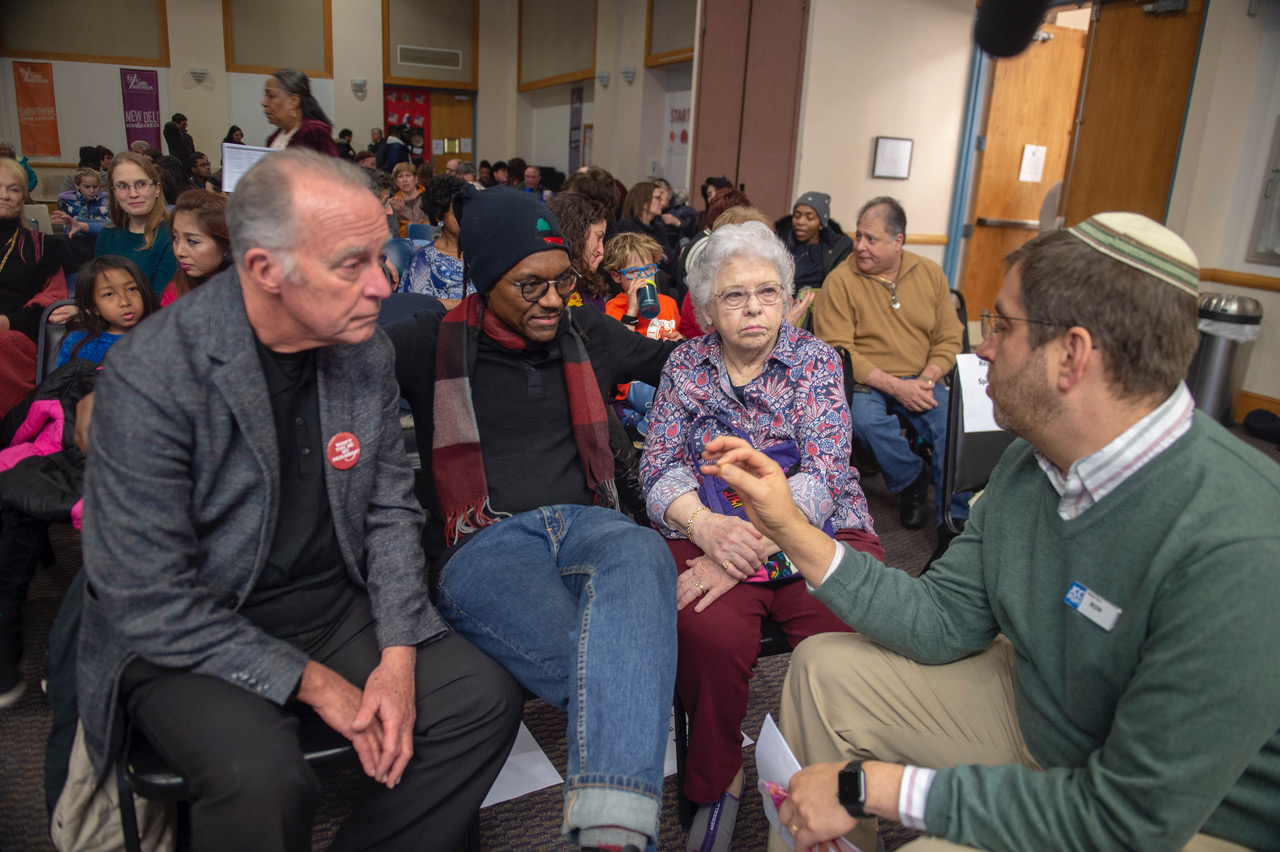 Group of people engaged in a conversation